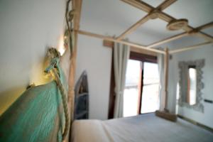 Postel nebo postele na pokoji v ubytování Tindaya Nature Home Ocean View
