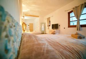 Posteľ alebo postele v izbe v ubytovaní Tindaya Nature Home Ocean View