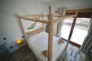 Posteľ alebo postele v izbe v ubytovaní Tindaya Nature Home Ocean View