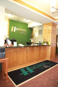 The lobby or reception area at Horizon Inn & Suites
