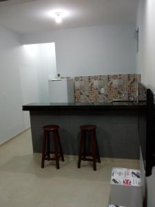 A kitchen or kitchenette at Residencial Aquidabã