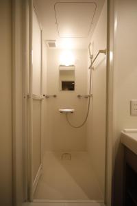 Ein Badezimmer in der Unterkunft Dormy Inn Korakuen