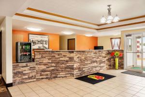 The lobby or reception area at Super 8 by Wyndham Holton