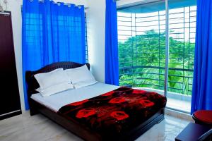 מיטה או מיטות בחדר ב-Saanha Windtrip