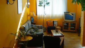 TV a/nebo společenská místnost v ubytování Hotel Virginia R.H.