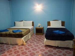 En eller flere senge i et værelse på Gypsy Village 2