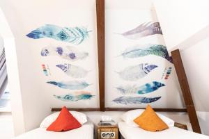 Postel nebo postele na pokoji v ubytování Hotel Pagi