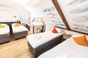 Postel nebo postele na pokoji v ubytování Hotel Pagi
