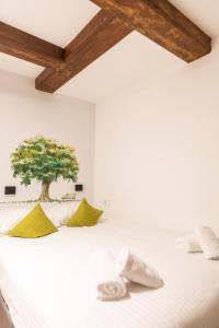 Postel nebo postele na pokoji v ubytování Hotel Pagi