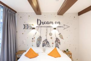 Postel nebo postele na pokoji v ubytování Hotel Pagi