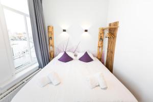 Postel nebo postele na pokoji v ubytování Hotel Pagi
