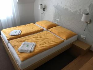Ein Bett oder Betten in einem Zimmer der Unterkunft Hotel Albis