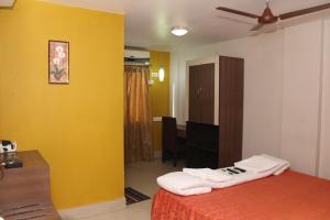 Llit o llits en una habitació de Hotel Shreesh