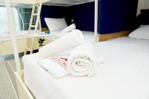A bed or beds in a room at Nar Palace