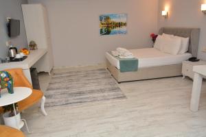 A bed or beds in a room at Nar Palace