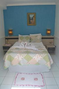 Cama o camas de una habitación en Porto Bahia Hotel
