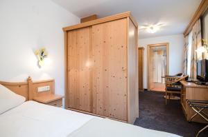 Posteľ alebo postele v izbe v ubytovaní Hotel Garni Subretta