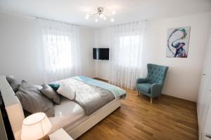 TV o dispositivi per l'intrattenimento presso Lake View Apartments