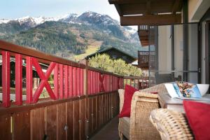 Een balkon of terras bij EXCLUSIVE APARTMENTS - inclusive Zell am See-Kaprun Sommerkarte und unbegrenztem Tauern SPA Eintritt