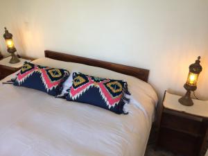 Postel nebo postele na pokoji v ubytování Casa Cuento