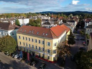 an overhead view of a building in a city at Hotel Unter den Linden in Krems an der Donau