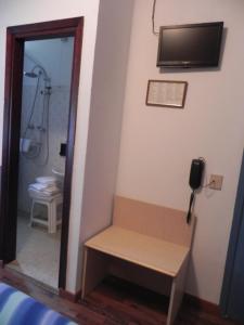 Postel nebo postele na pokoji v ubytování Hotel Antonella