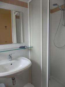 Koupelna v ubytování Hotel Antonella