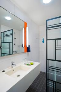 
Ванная комната в Solo Sokos Hotel Lahden Seurahuone
