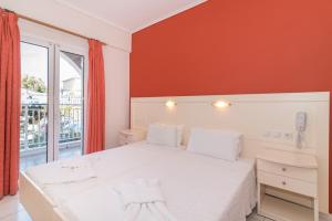 Postel nebo postele na pokoji v ubytování Dados Hotel