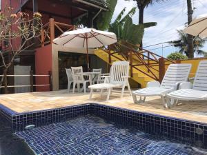 A piscina localizada em Pousada Vila do Sol Juquehy ou nos arredores