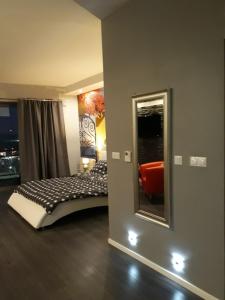 Posteľ alebo postele v izbe v ubytovaní Apartament Onyx