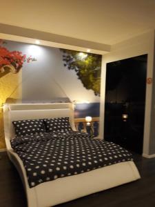 Posteľ alebo postele v izbe v ubytovaní Apartament Onyx