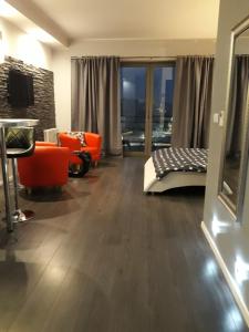 Posteľ alebo postele v izbe v ubytovaní Apartament Onyx