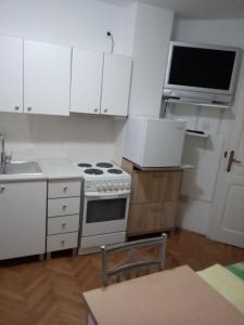 Η κουζίνα ή μικρή κουζίνα στο Hostel Corner 021