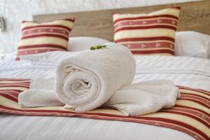 Ein Bett oder Betten in einem Zimmer der Unterkunft Apartmán ENZO č 103 Tále Chopok Juh