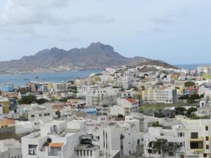 a view of a city with buildings and the ocean at La Residencia in Mindelo