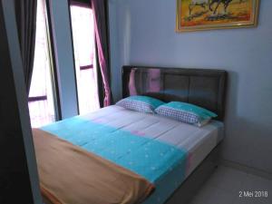 Voodi või voodid majutusasutuse Villa Batu Safir toas