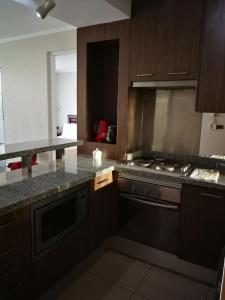 Nhà bếp/bếp nhỏ tại Austral Rentahome Republica Árabe de Egipto