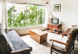 Posezení v ubytování BL10 Bahia Langosta On the Beach 1bed+1bath