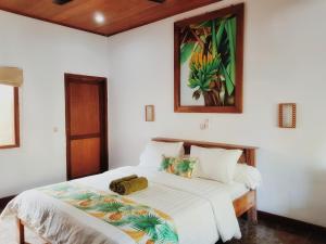 Postel nebo postele na pokoji v ubytování Havana Hideaway