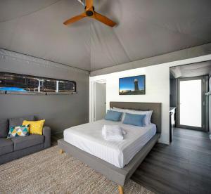A television and/or entertainment centre at Discovery Resorts - Rottnest Island