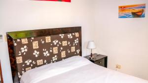 Postel nebo postele na pokoji v ubytování CWC Casa Wasabi 1bedroom 1bathroom + 25 fotografií