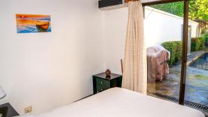 Postel nebo postele na pokoji v ubytování CWC Casa Wasabi 1bedroom 1bathroom