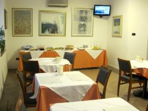 Reštaurácia alebo iné gastronomické zariadenie v ubytovaní Hotel Ristorante Anita