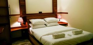 Postel nebo postele na pokoji v ubytování Akiri Surf Retreat