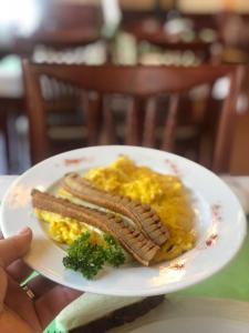 Afbeelding uit fotogalerij van Csillag Panzio in Lunca de Jos