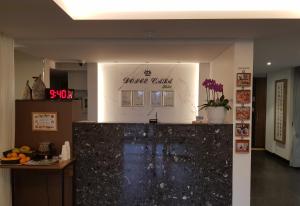 a lobby of a restaurant with a granite counter top at Namyangju Bukhangang dolcecasa hotel in Namyangju