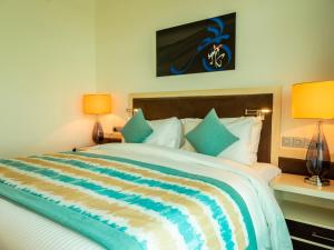 Katil atau katil-katil dalam bilik di Retaj Salwa Resort & Spa