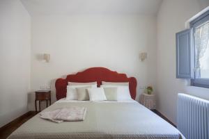Postel nebo postele na pokoji v ubytování Podere La Contessa B&B