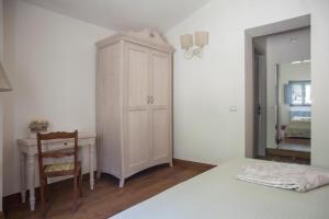 Postel nebo postele na pokoji v ubytování Podere La Contessa B&B